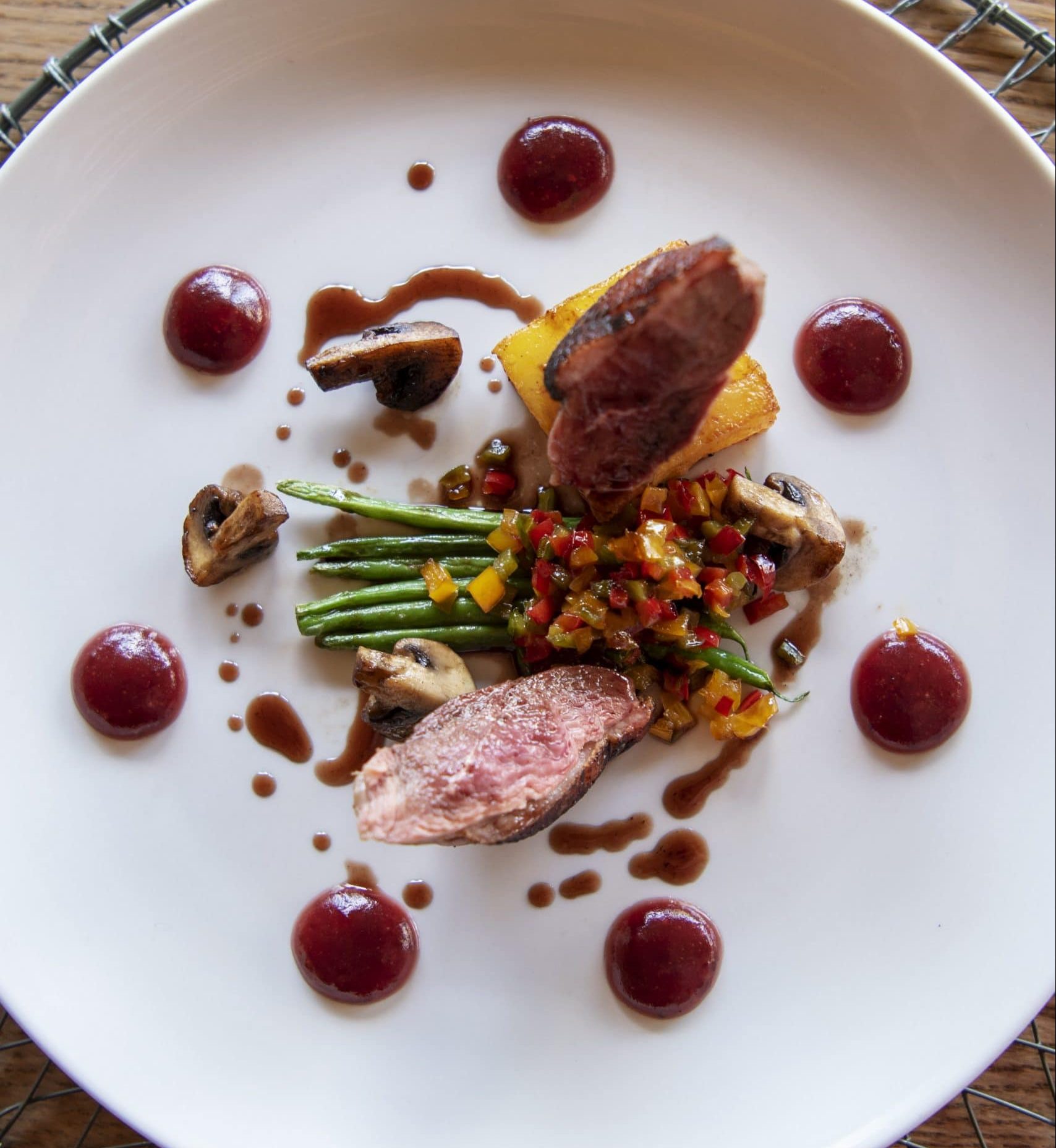Jabulani-Dining-Pan Fried duck Breast, with potato fondant, cranberry jelly, ratatouille vegetables, young spinach, baby gem squash and rosemary jus - Alex 2